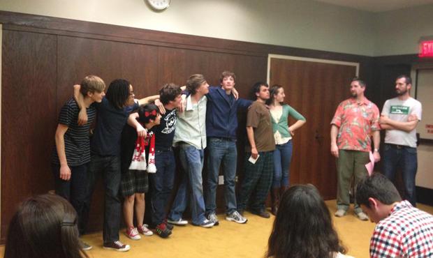 Photo courtesy of Margaux Forster ’12. Finalists pose for a picture after competing in a poetry slam. 