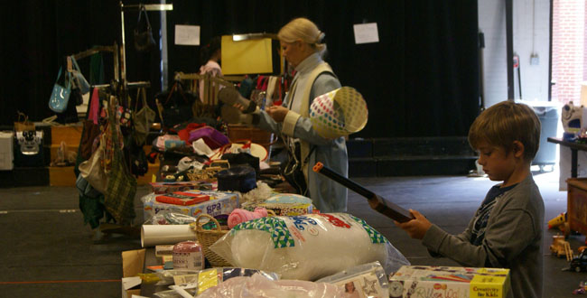 Photo by Connor Gillooly 14 | Shoppers look through merchandise at Choir Garage Sale on Saturday Sept. 22. 