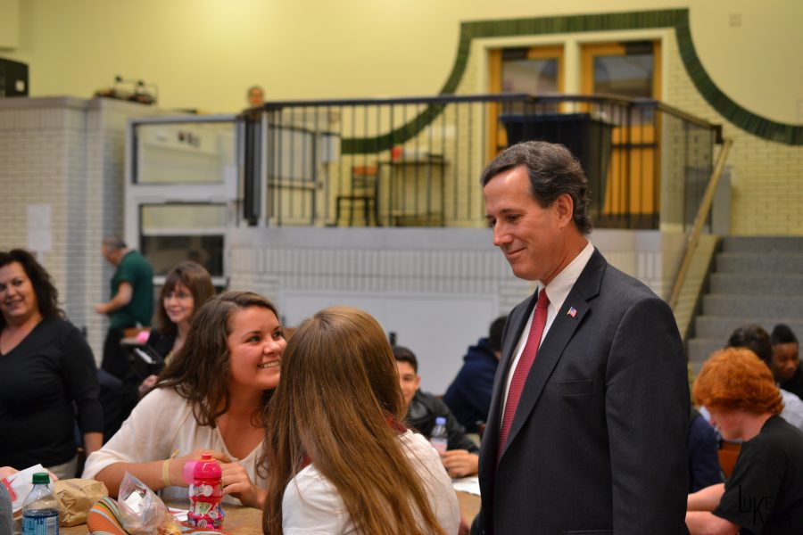 Santorum visits with students in the commons area on Wednesday, March 24.