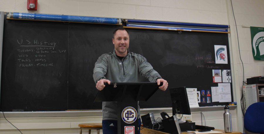 Teacher returns after month-long recovery from shoulder surgery