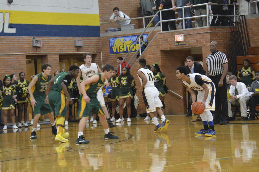 Boys basketball tops crosstown rival North, 58-54