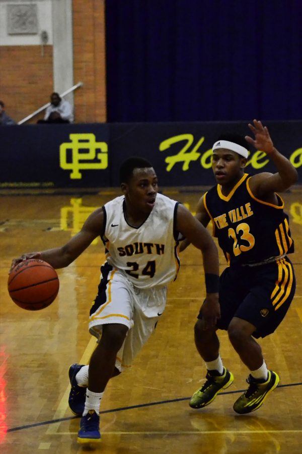 Boys basketball loses playoff game to Detroit East English Village, 75-64