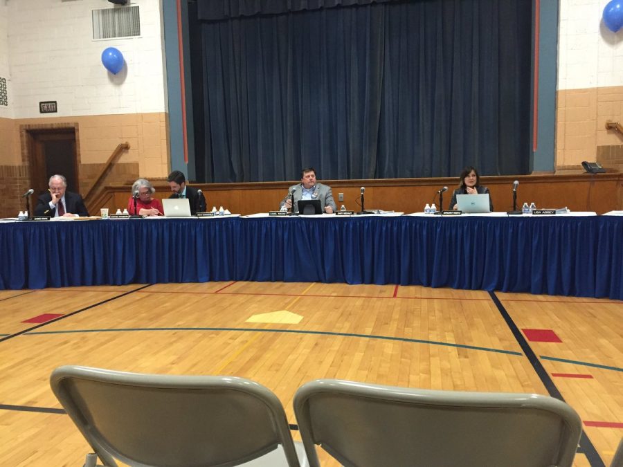 Students and parents support Principal Hamka at school board meeting