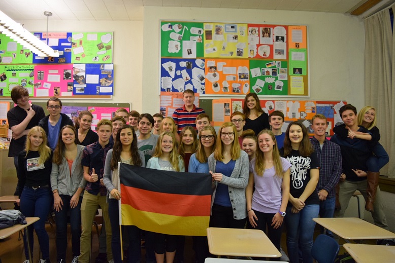 German students gather during class. 