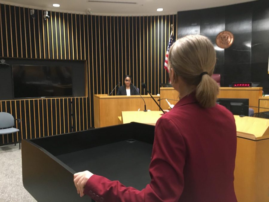 Jessica Dodge 19 practices in the courtroom for the upcoming state competition. Photo courtesy of Dodge. 