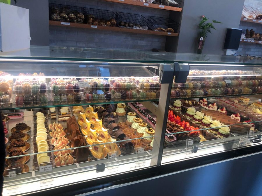 At Canelle, the overwhelming display case has a variety of options of sweets such as macaroons and chocolate eclairs. Photo by Charlotte Parent 21.
