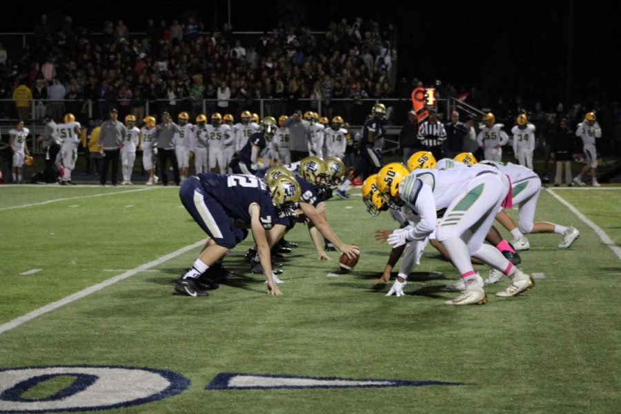 The Blue Devils faceoff against Grosse Pointe North  Oct. 18. The Blue Devils have lost only two games this season. Photo by Zach Farrell 21.