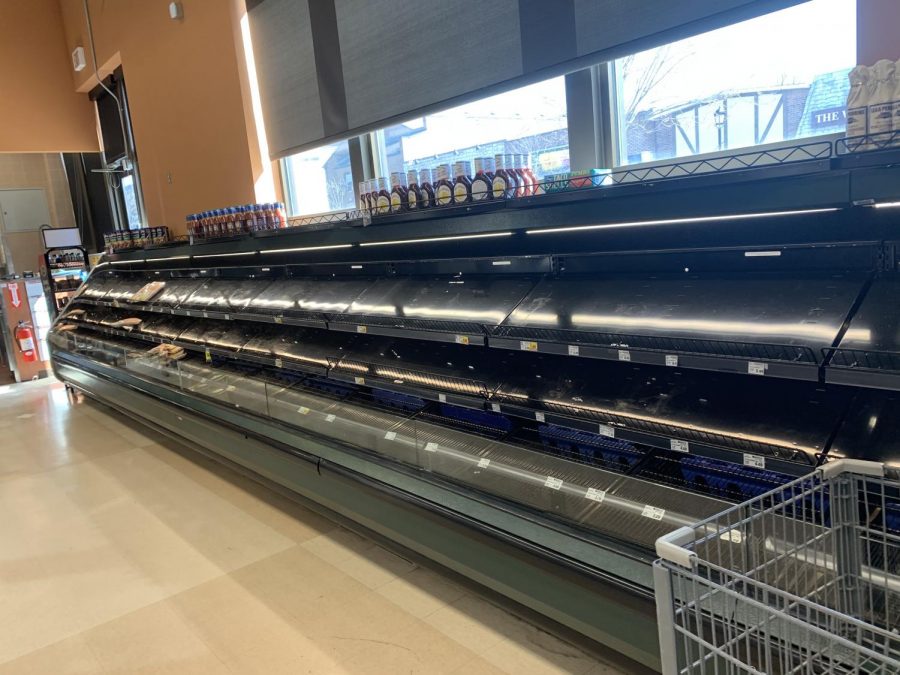 The prepared meat/meat section is nearly empty on March 13, 2020. 