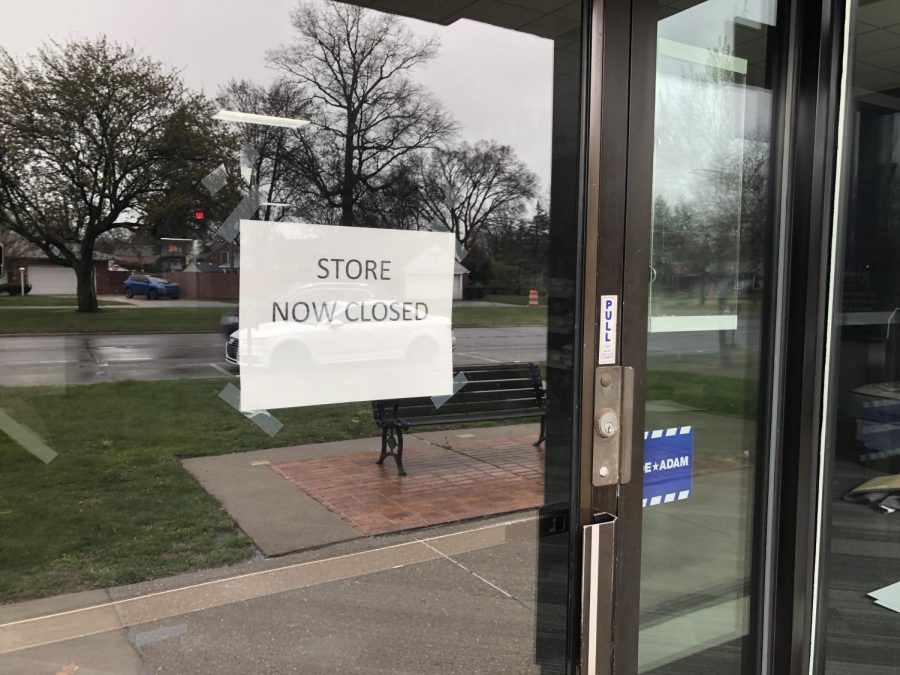 Nonessential stores, like this one, are ordered closed to customers under Gretchen Whitmers order. Photo by Matthew Kornmeier 21.