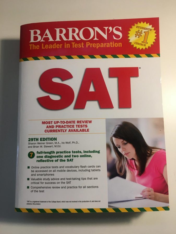 Many+students+rely+on+prep+books%2C+such+as+this+one%2C+to+prepare+for+the+SAT.+This+year+the+SAT+offered+to+every+junior+through+school+day+testing+has+been+cancelled%2C+however+many+are+taking+time+in+quarantine+to+study+in+anticipation+of+being+able+to+test+in+the+fall.+Photo+by+Nina+Simon+21.