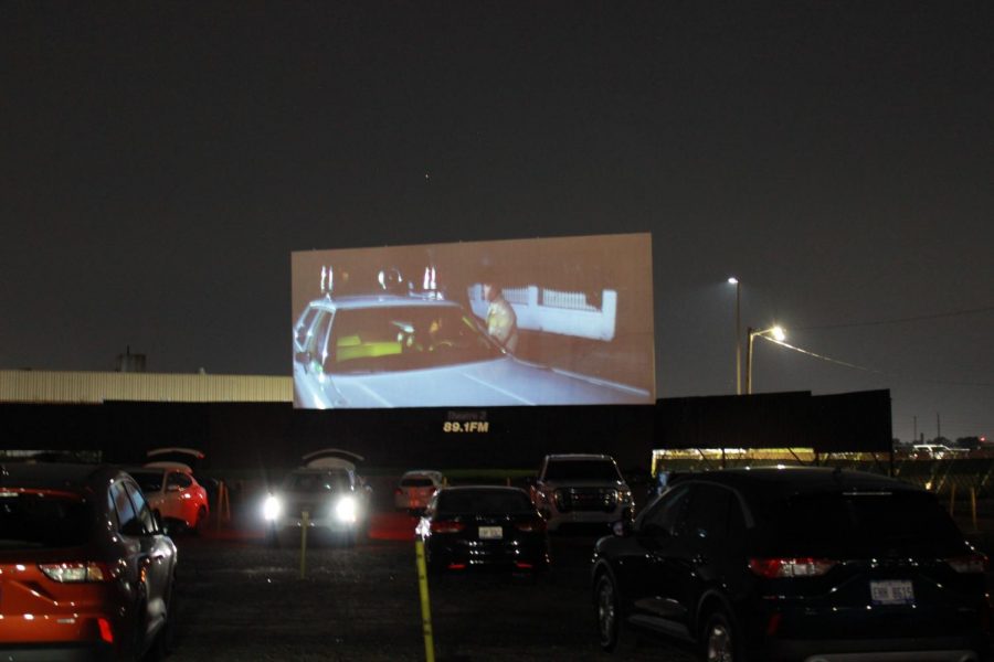 Families gathered under the stars to watch the film Halloween at the Ford Drive In.
