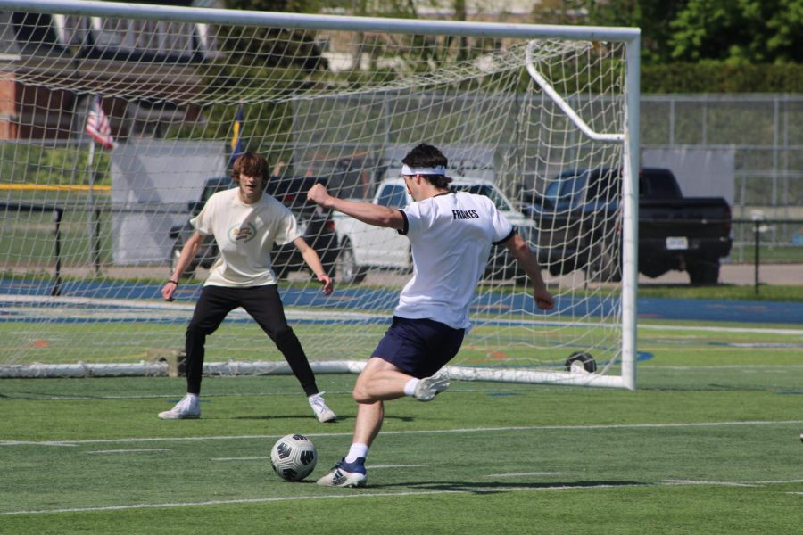 Benjamin Frakes ’23 take a shot at goal for the German club, narrowly missing the net.