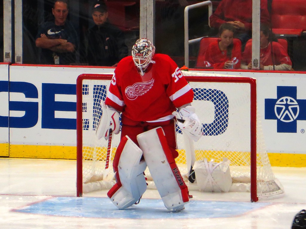 Jimmy Howard Detroit Red Wings goalie standing in the net blocking a goal. (Courtesy of  Wikimedia Commons)