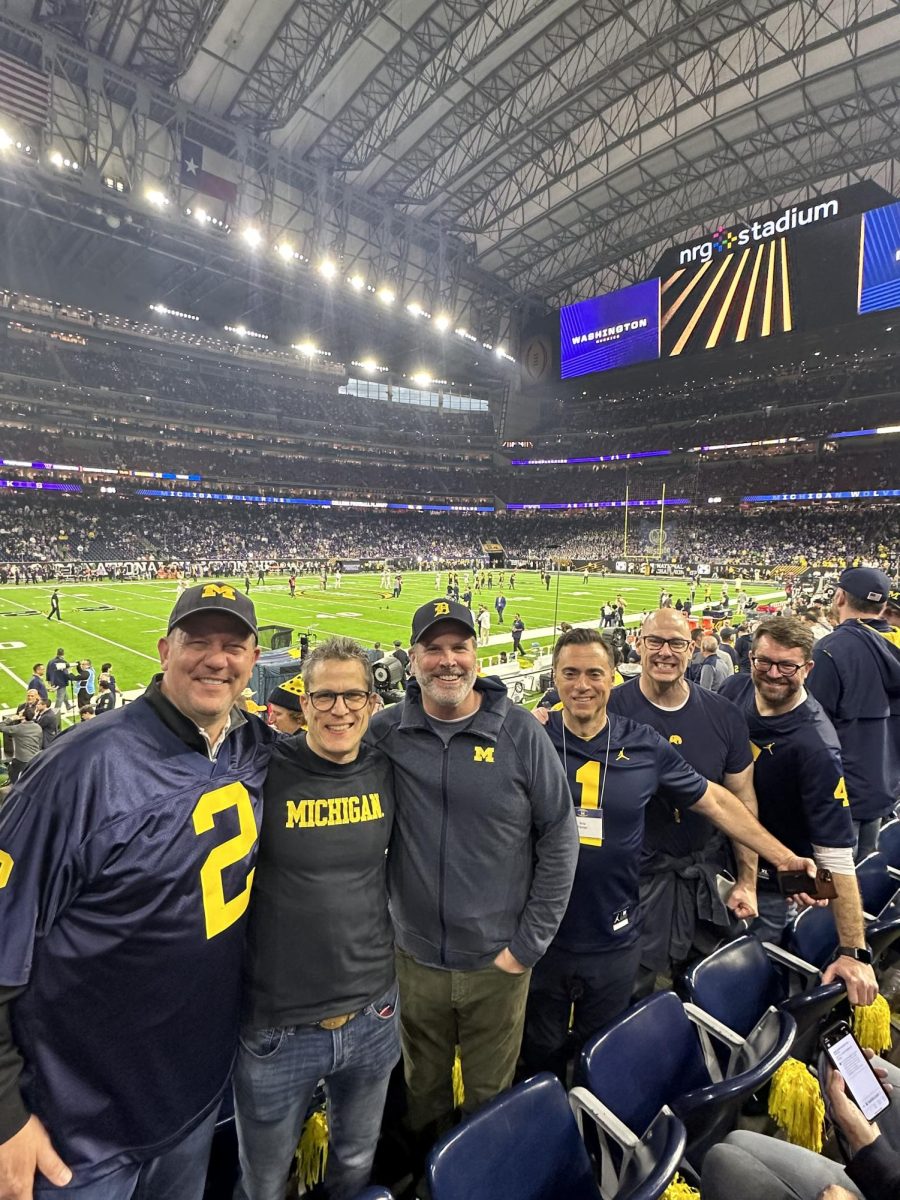 CFP National Championship Photo, Mr. Martin (second from right), with friends celebrating Michigans victory