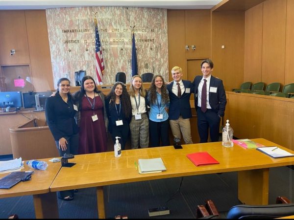 Last year’s Mock Trial team standing together proudly, after winning an honorable mention.