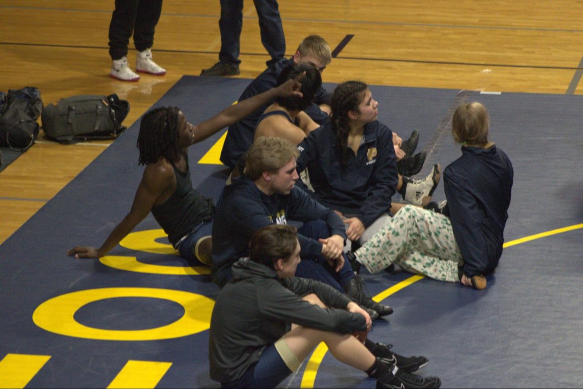 Grosse Pointe South’s wrestling team gathered before their matches. 