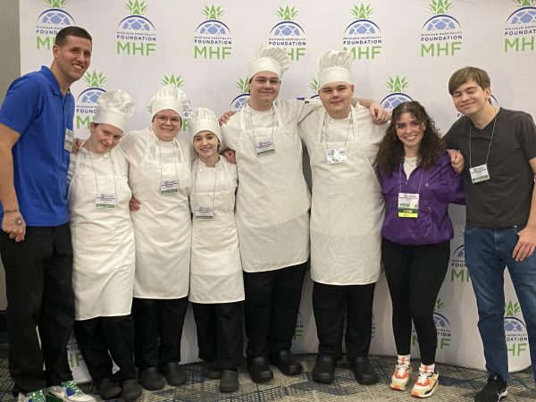 A moment of jubilation for the Grosse Pointe South culinary team. Chef Lopez (far left) poses with his students after winning the state competition and knocking out last years national champion Plymouth Canton Educational Park at the state Prostart tournament in Kalamazoo. We took out the defending national champions from last year. So just to get through that team is huge. If we get through the state, we typically do well at nationals because getting out of Michigan is hard enough, Lopez said.       

(Photo courtesy of Nikolas Lopez)