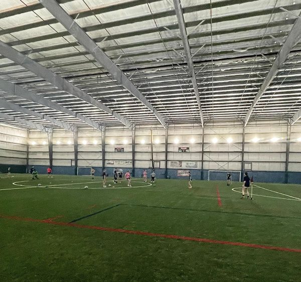  South’s varsity and junior varsity soccer team practicing together at Total Soccer, the backup facility for when the home turf is unavailable.