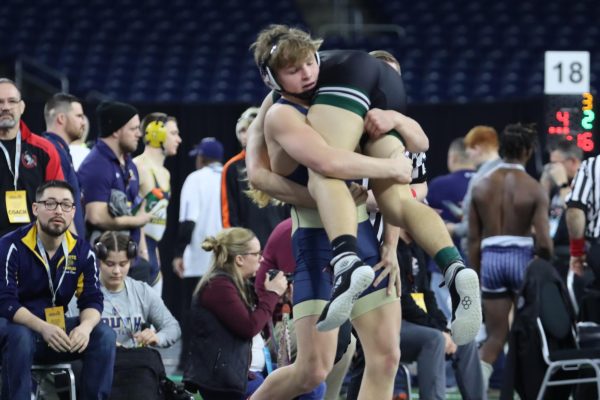 Wyatt Hepner pictured at Ford Field with his opponent Carlos Sanchez during their match at States. 