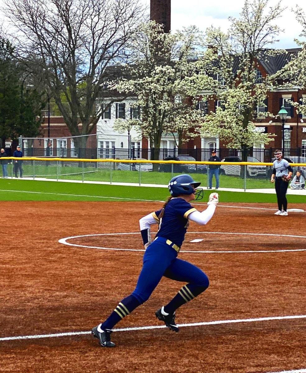  Vivi Ostrowski ’26 rounds third base, heading home to score a run. The run contributes to a 10-0 Blue Devil victory of Birmingham Seaholm.
