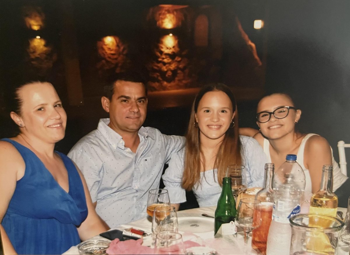 Leonora posing for a picture with her parents and sister. “ The one thing I miss the most about Greece is my family”, Kojku said.
