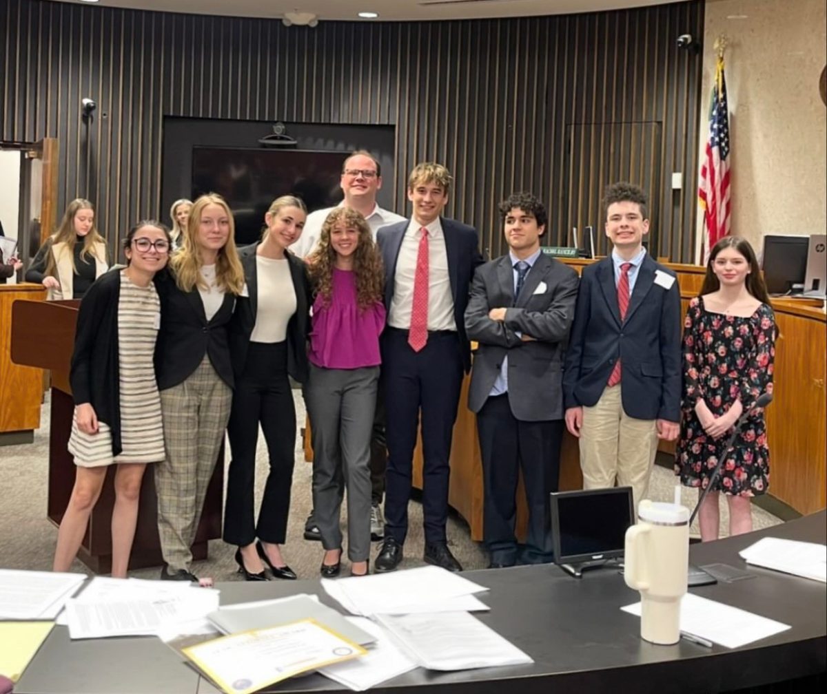 South’s Mock Trial Team poses in one of the rooms in the Macomb County Courthouse after the last of their three trials during their competition last March. (Courtesy of GPS Mock Trial Instagram)