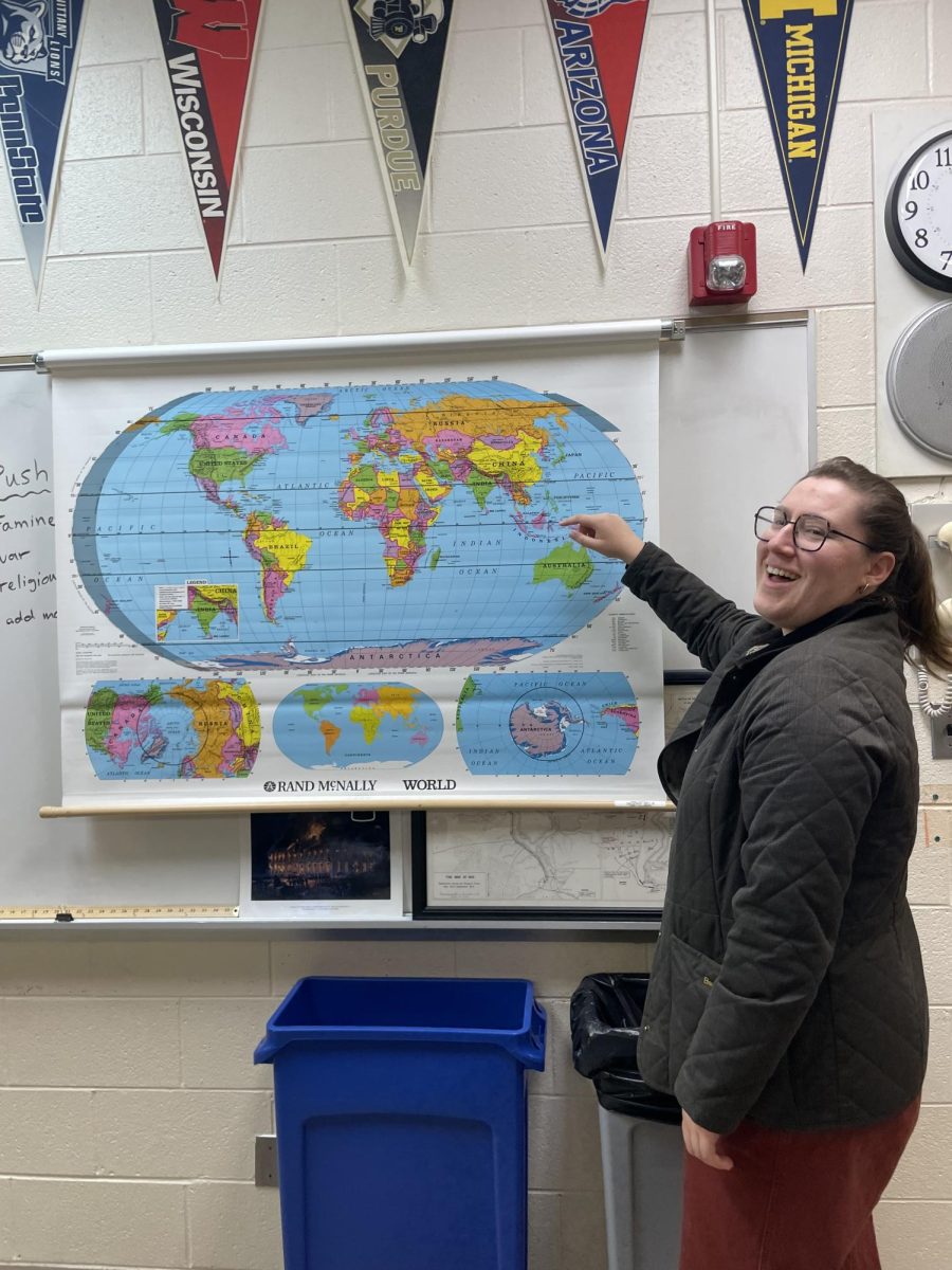 Student teacher Madeline Campbell instructs AP Euro students on worldwide geography. 
