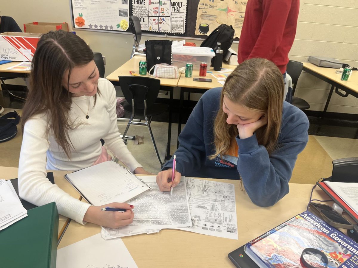 Isabella Rondini '25 and Ellie Weiss '26 studying for their "Chemistry Lab" event during the Hawk and Hornet tournament. Grosse Pointe South would go on to place 40 overall.