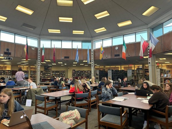 An overflow of students studying takes over the Blue Devil Learning Center.