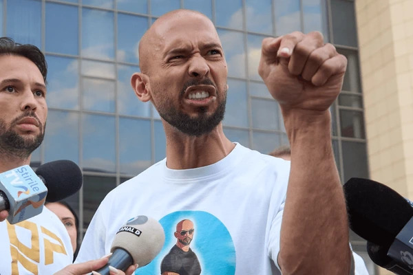 Andrew Tate, 38, interviewed by the press following the Romanian court’s decision to place him under house arrest. 