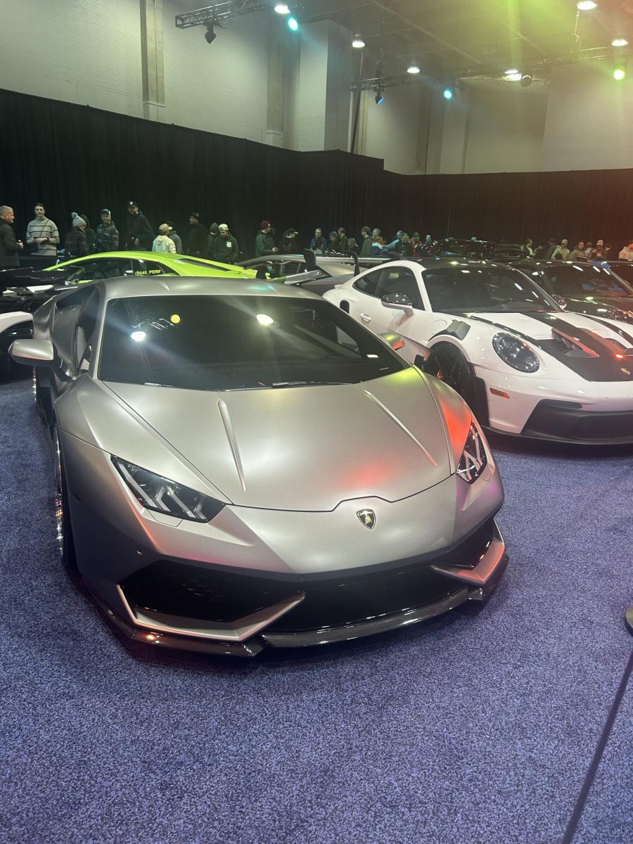 A Lamborghini Huracan (left) pictured next to a Porsche 911 GT3RS (right), both cars are a part of the Detroit Auto shows community car display. The display is presented by Modded Detroit, and has over 150 vehicles donated for the show by people in the Detroit area. 