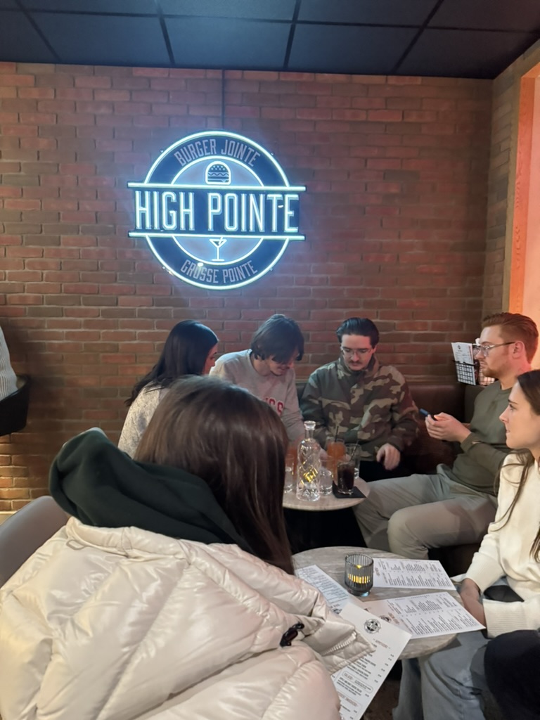 Customers enjoy a relaxing night of fun and food at High Pointe Burger Jointe.