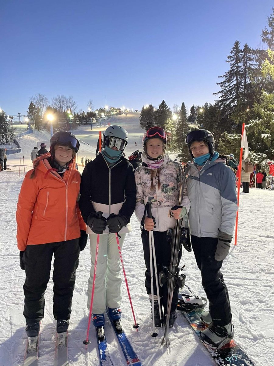 Caroline Ward, Elena Huebner, Chloe Slawson, And Ava Babcock all ’26 get ready to hit the slopes on the first skiing field trip of the year. 