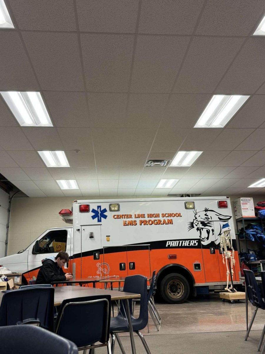 Center Line High School EMS trucks sits in the class in front of all the students
