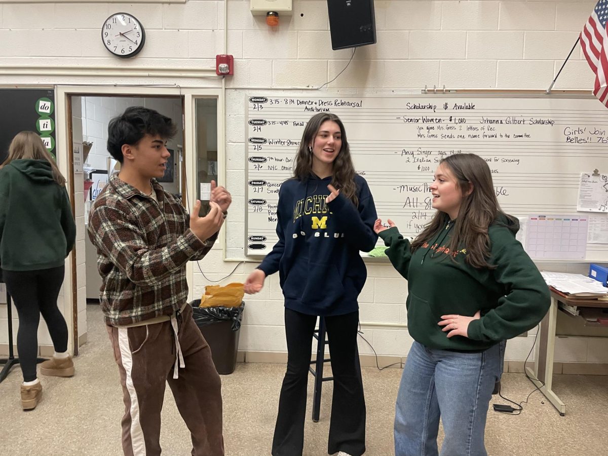 Sage Suson '26, Jolina Huchingson '25 and Allison Thomas '25 practice their lines for the musical.