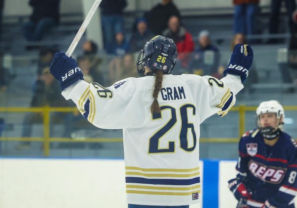 Tinley Gram ’27 celebrates after scoring a goal against one of the girls’ ice hockey team’s biggest rivals, the Traverse City Bay Reps.