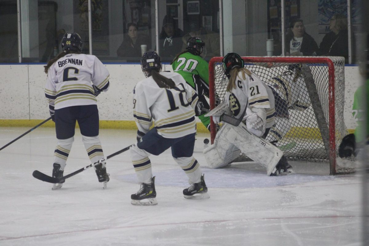 Mid-Michigan trying to recover the puck after a shot attempt. They failed to score a goal, getting shutout.