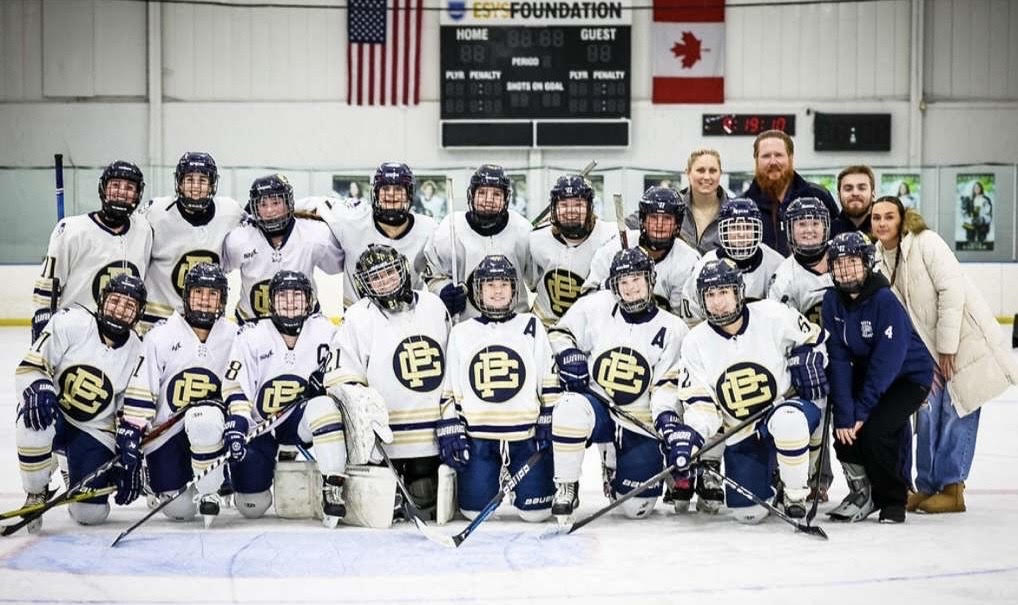 The Girls Hockey team stands for a team photo after winning their match. Photo courtesy of Leon Halip.