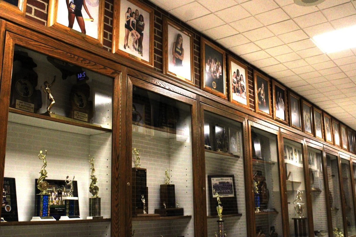 South’s Athletic Hall of Fame is located on the first floor of the S-building, showcasing the trophies and achievements of student athletes throughout an extensive trophy case. Above hang portraits of the school’s all-state athletes dating back to the 1900s.