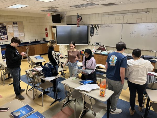 South’s Science Olympiad team studies and prepares for the University of Michigan tournament. The team has a collaborative study environment, bouncing off ideas and strategies that will help them place in their respective event.