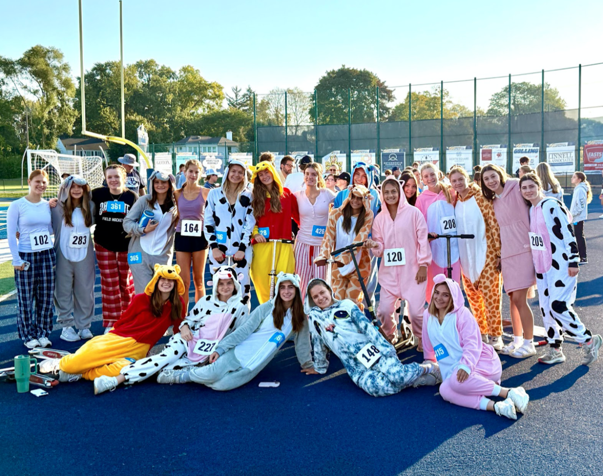 Grosse Pointe South Varsity and JV field hockey teams getting ready to participate in Run the Pointe on Sept. 27, 2025. 
