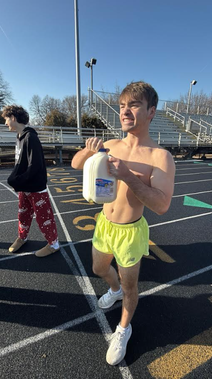 Punished: Brady Cooper '28 prepares for the milk mile after losing his Fantasy Football league. The milk mile is
a popular Fantasy punishment that requires the loser to run a mile while drinking a whole gallon of milk. Photo courtesy of Brady Cooper.