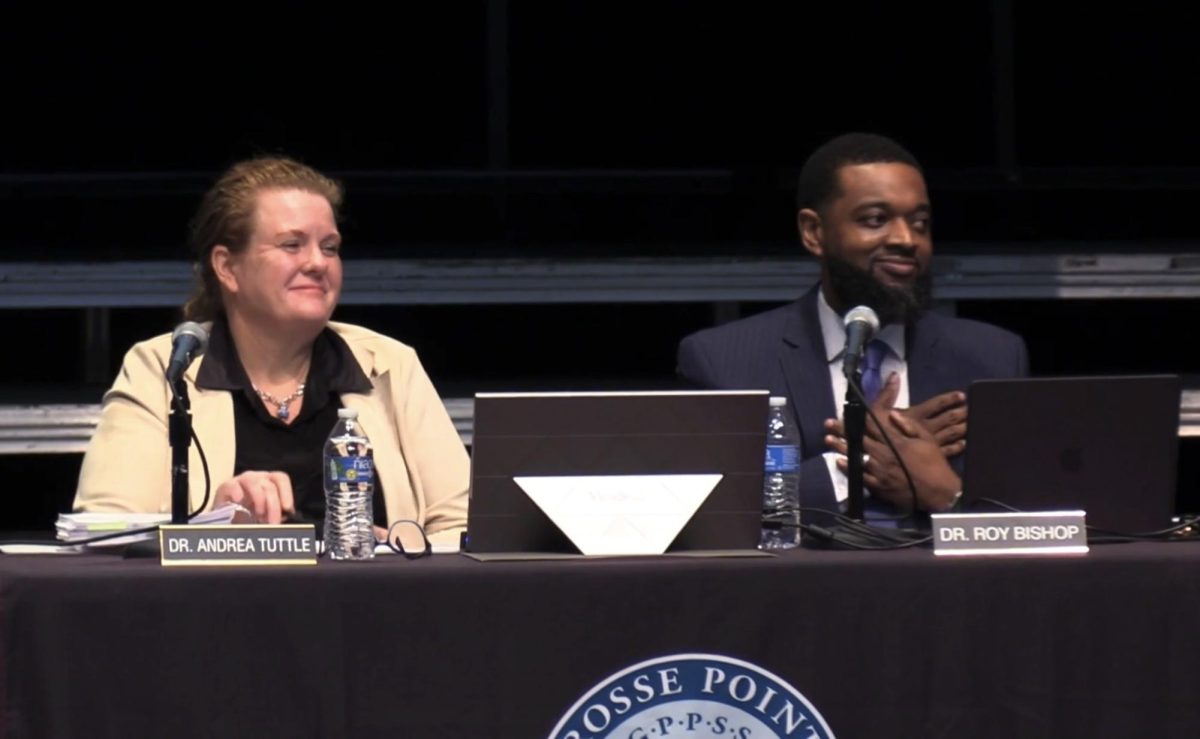 Deputy Superintendent Dr. Roy Bishop, alongside Superintendent Dr. Andrea Tuttle, reacting at the March 9 Board of Education meeting as he was confirmed as the Grosse Pointe Public School System’s next superintendent. Photo courtesy of the Grosse Pointe Public School System
